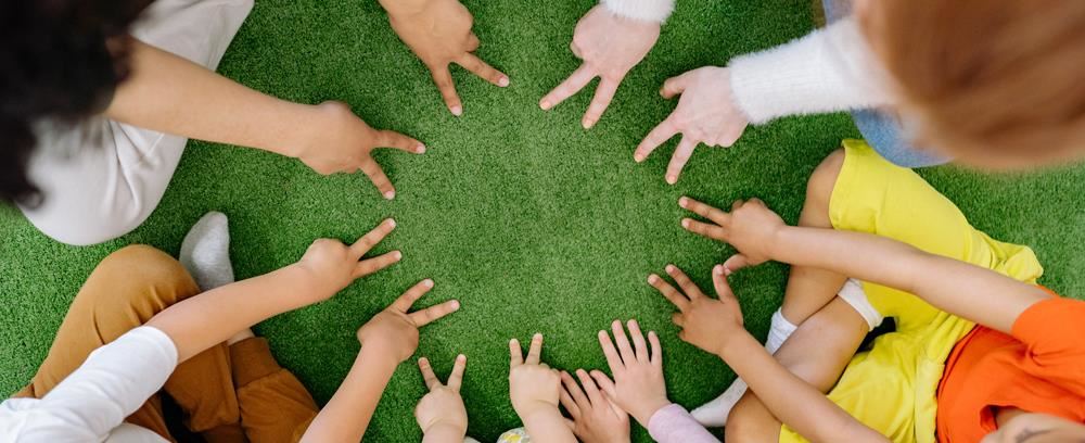 Diverse Kids hands in a circle